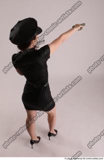 16 NIKITA POLICEWOMAN STANDING POSE WITH TWO GUNS